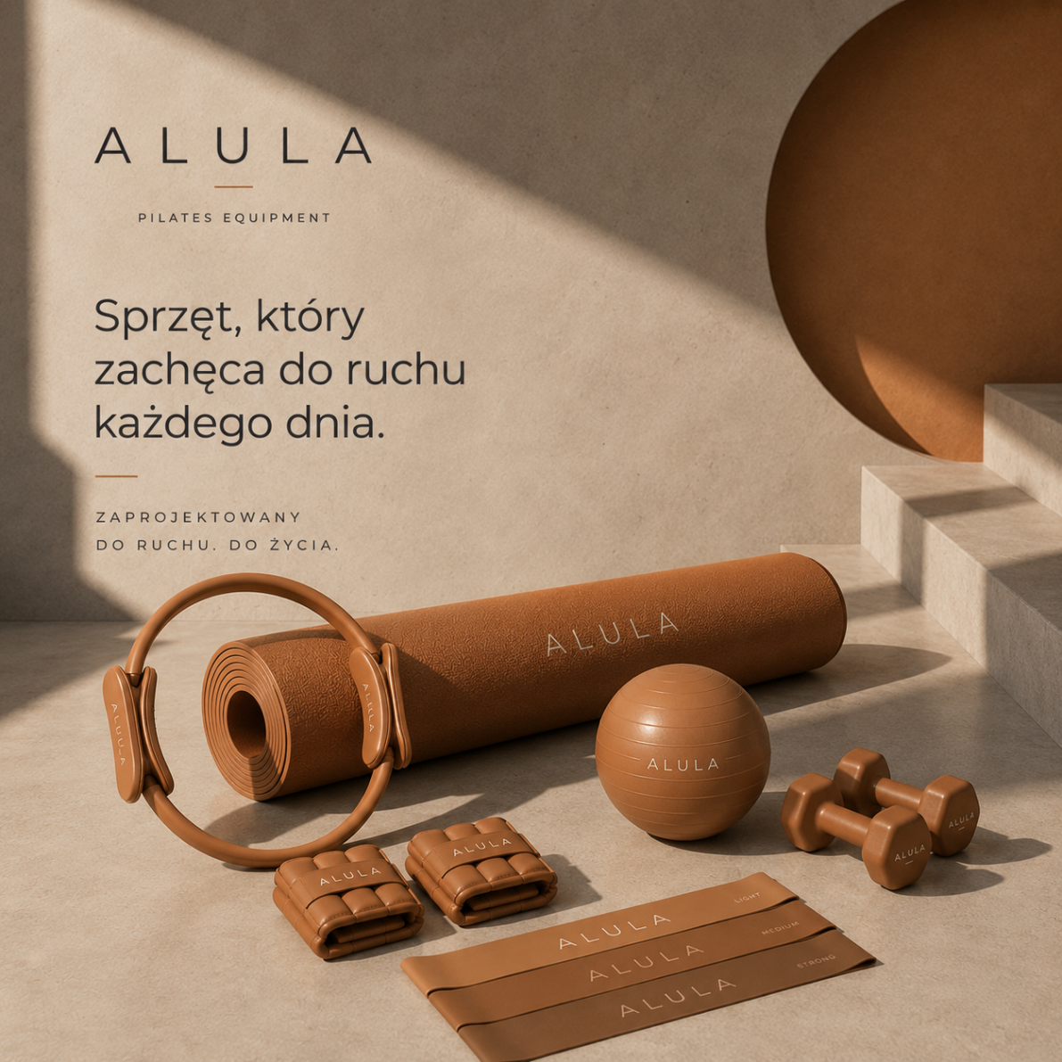 Pełny zestaw Alula w odcieniu karmelowym: mata, ring, piłka, taśmy i ciężarki